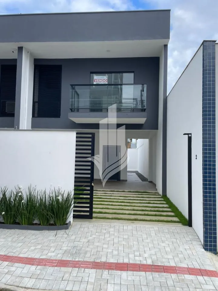 Sobrado Geminado em Barra Velha, Bairro Itajubá, com 123,25m, contendo 3 dormitórios, sendo 1 suíte com sacada. - foto 1