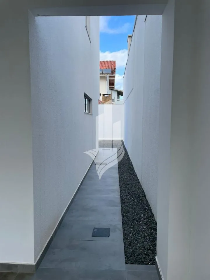 Sobrado Geminado em Barra Velha, Bairro Itajubá, com 123,25m, contendo 3 dormitórios, sendo 1 suíte com sacada. — foto 5