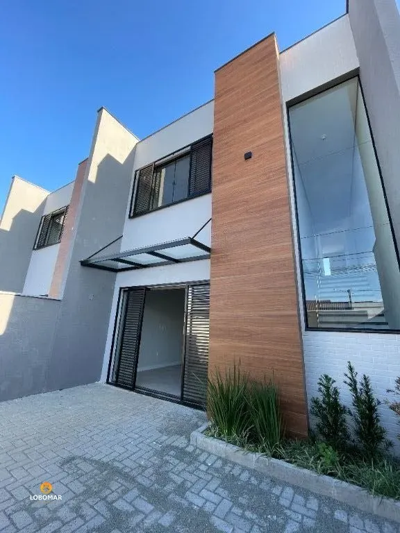 Sobrado com 3 dormitórios à venda, 113 m por R$ 690.000,00 - Centro - Balneário - foto 1