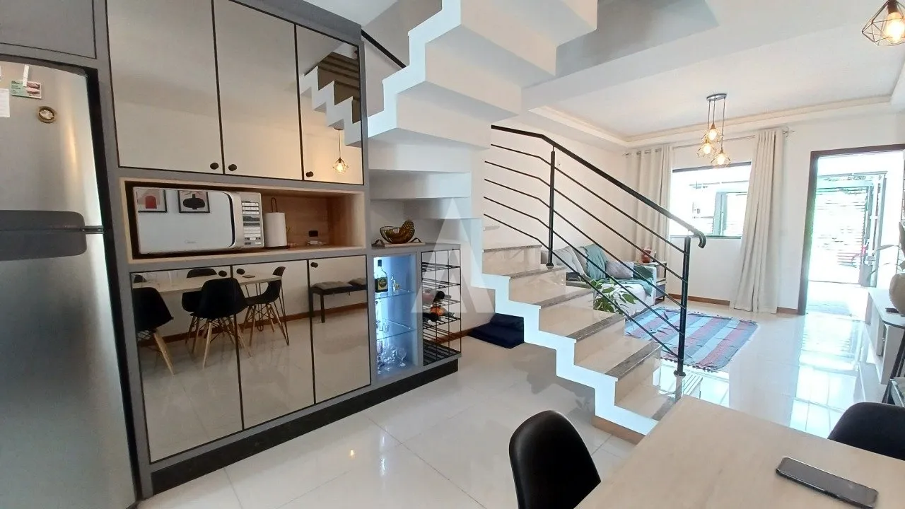 Sobrado Geminado com 1 suíte(s) mais 2 quarto(s) à venda no bairro SAGUACU em JOINVILLE, por R$ 635.000.00. — foto 7