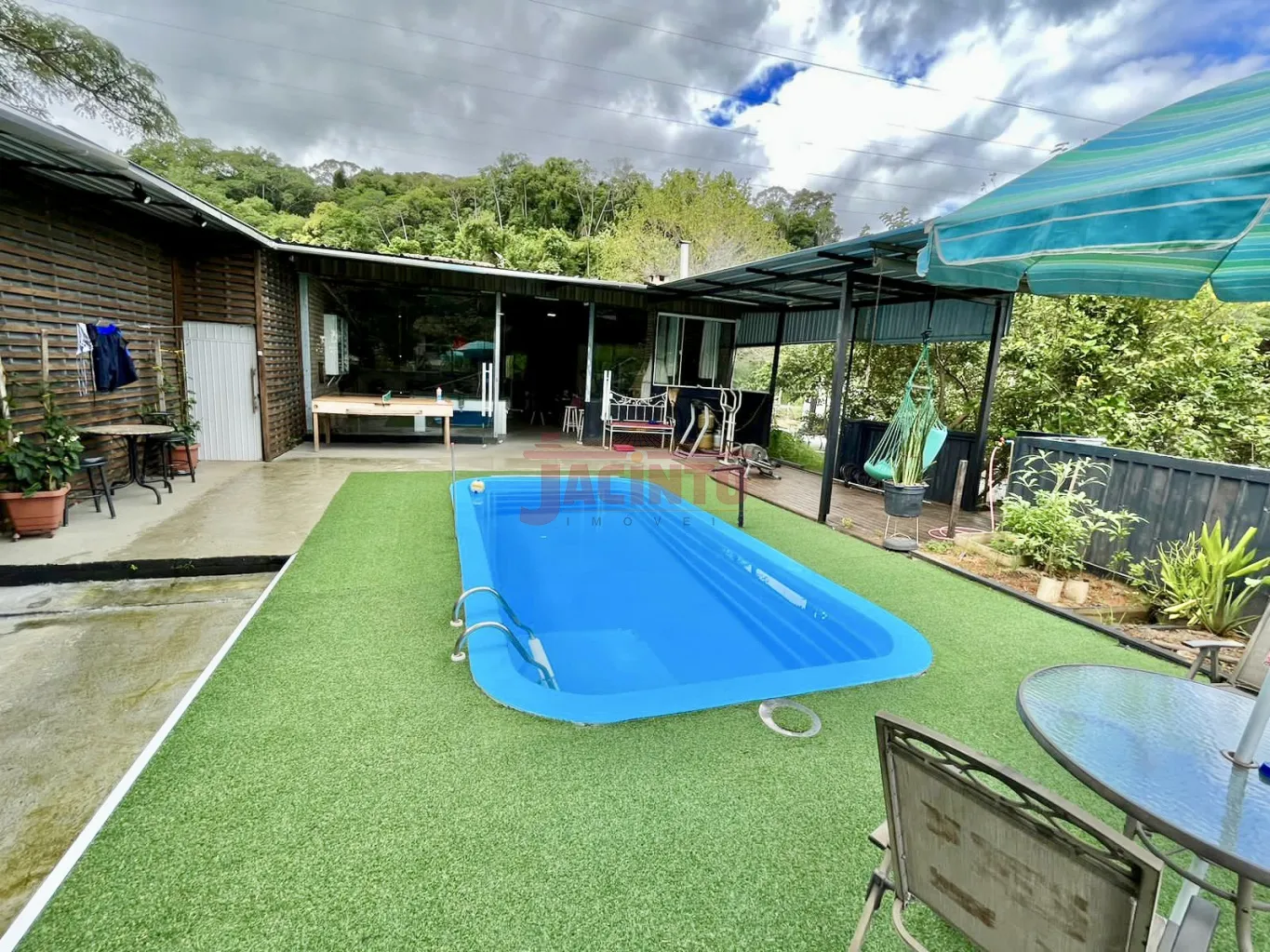 Imóvel com 1 casa, 1 sobrado e 1 galpão no bairro Belchior Central. - foto 1