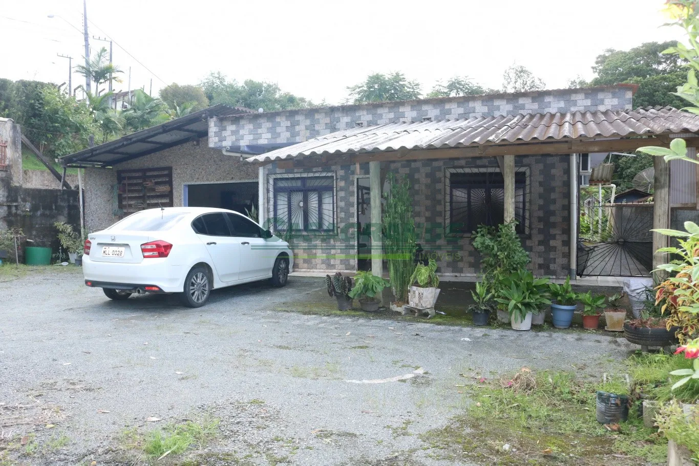 Casa no bairro Itoupava Central, 735,93m2 de área do terreno, 3 dormitórios, sala, sala de jantar, cozinha, banheiro, amplo espaço de terreno e pomar nos fundos, 1 vaga de garagem coberta. — foto 5