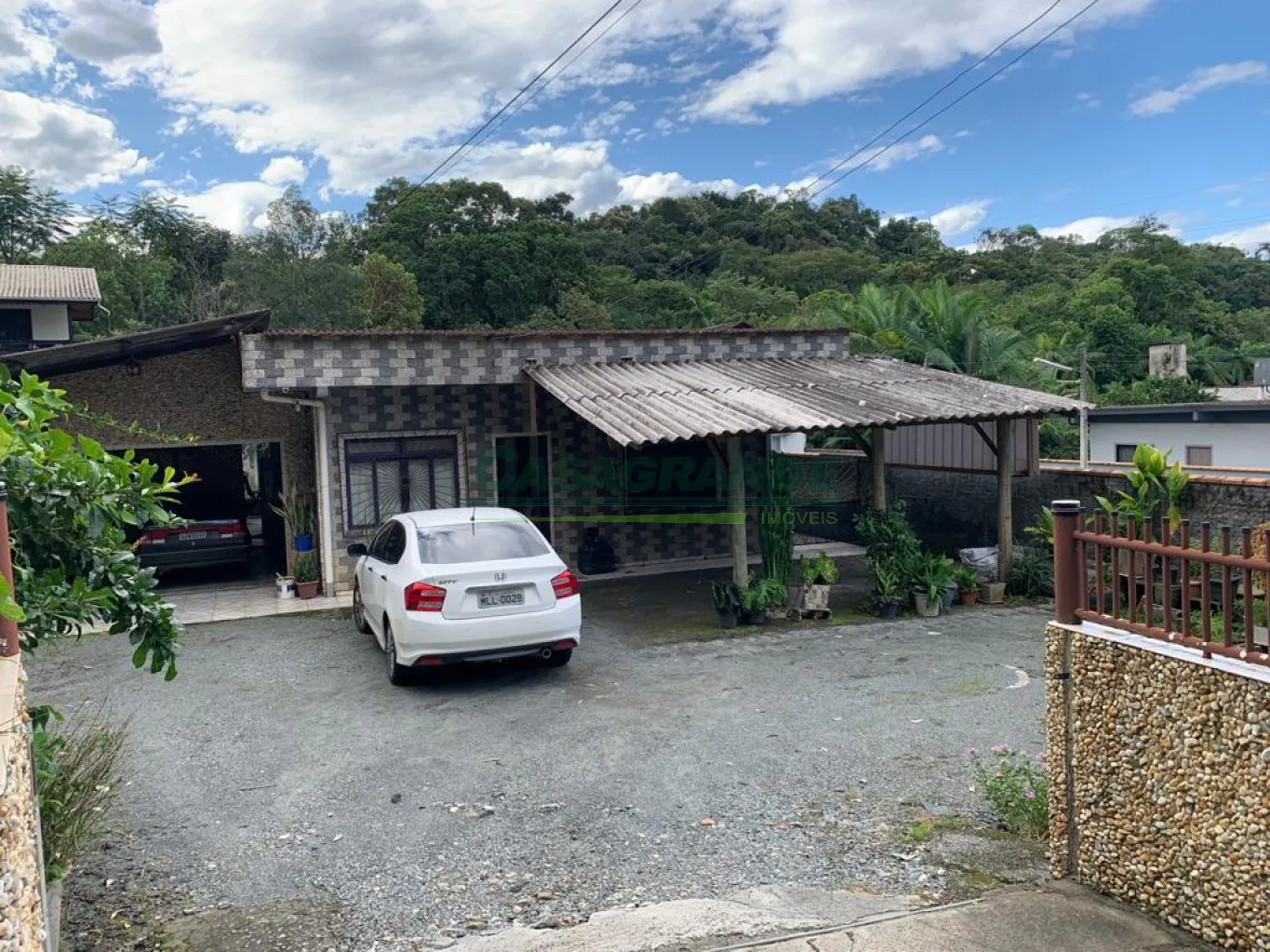 Casa no bairro Itoupava Central, 735,93m2 de área do terreno, 3 dormitórios, sala, sala de jantar, cozinha, banheiro, amplo espaço de terreno e pomar nos fundos, 1 vaga de garagem coberta. — foto 6