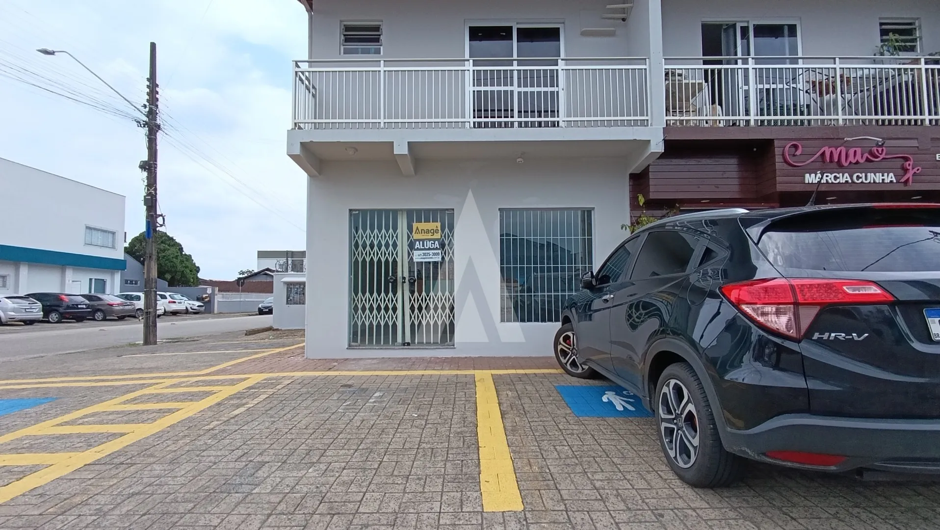 Loja no bairro Comasa com aproximadamente 40,94m e 1 lavabo interno e uma área externa com 4 vagas rotativas de estacionamento. - foto 1