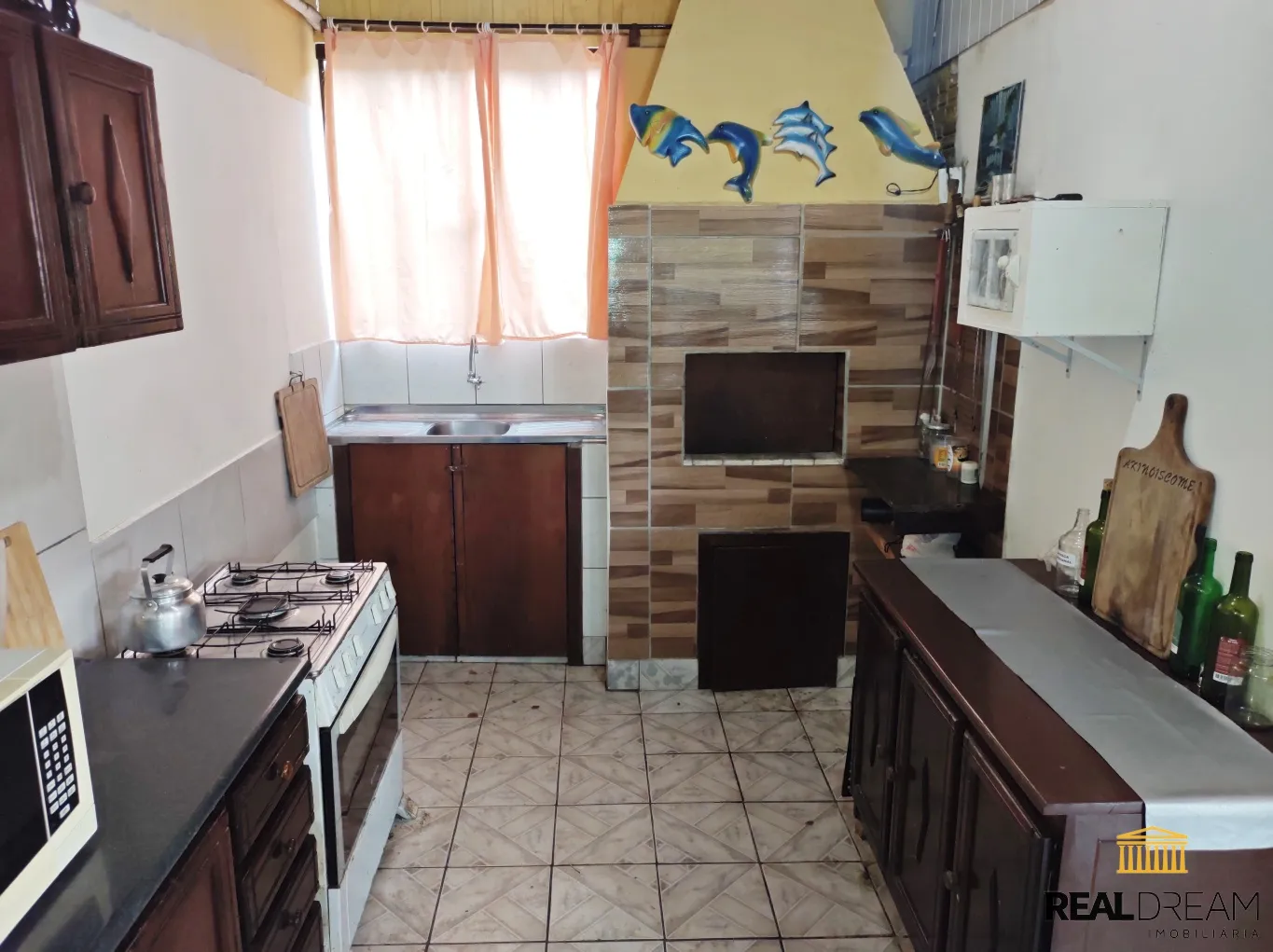 Casa com 4 dormitórios com área de festa e churrasqueira — foto 3