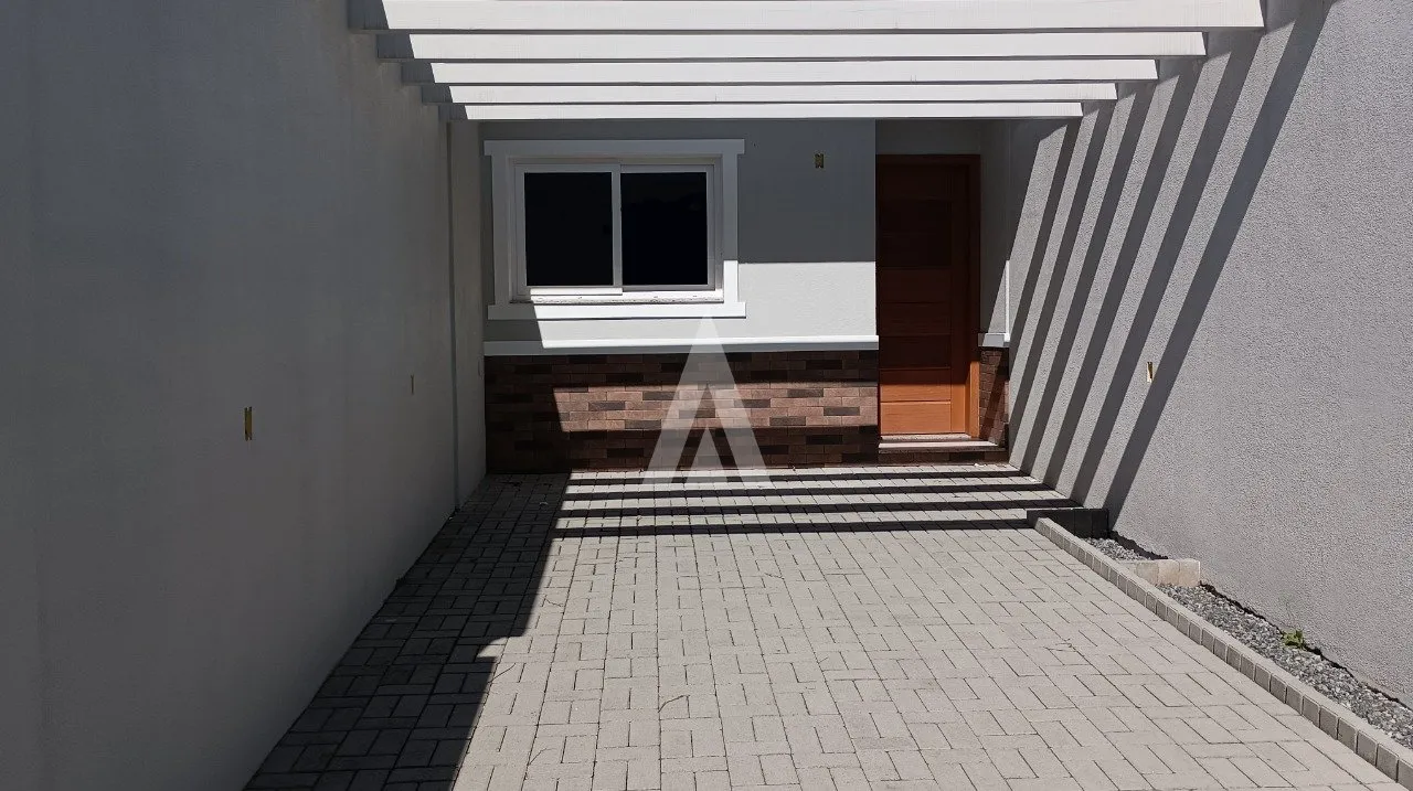 Casa Geminada com 1 suíte(s) mais 1 quarto(s) à venda no bairro João Costa em Joinville, por R$ 399.000.00. — foto 2