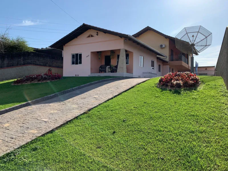 Imóvel com 02 moradias e piscina no Bairro Carijós - foto 1