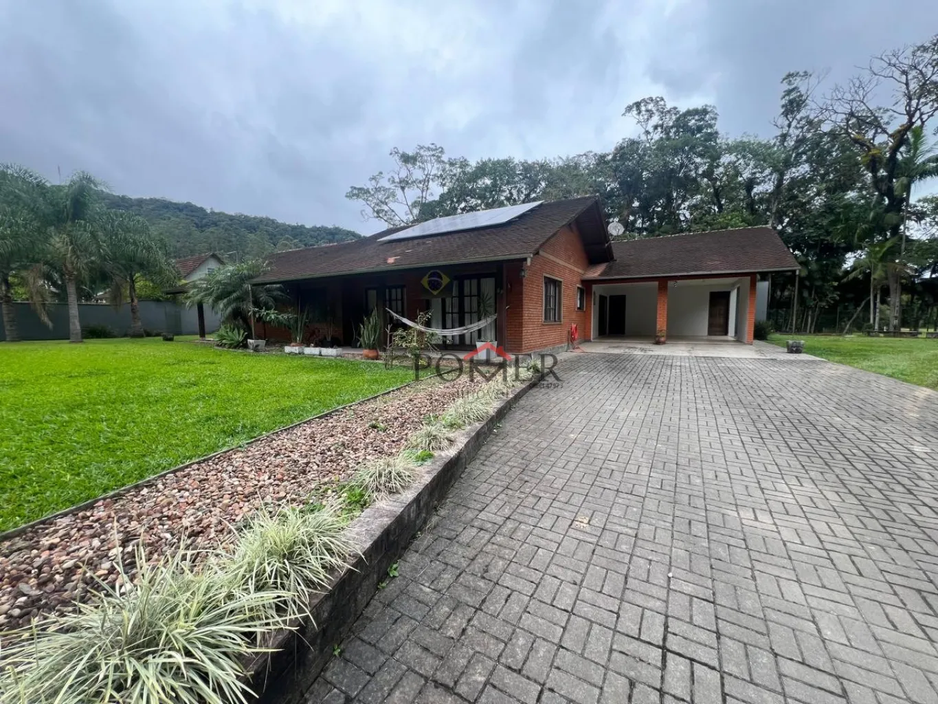 Belíssimo Sítio, com uma linda casa de tijolos a vista, no Bairro Rega, na cidade de Pomerode, edificada num terreno com 25.880,80m. — foto 4