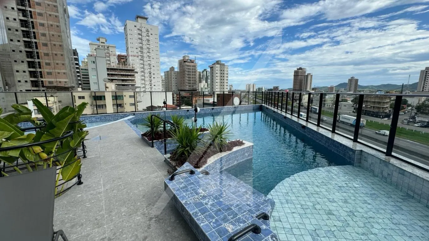 APARTAMENTO COM TRÊS SUÍTES, DUAS VAGAS DE GARAGEM E CONDOMINIO COMPLETO - MEIA PRAIA/ ITAPEMA - foto 1