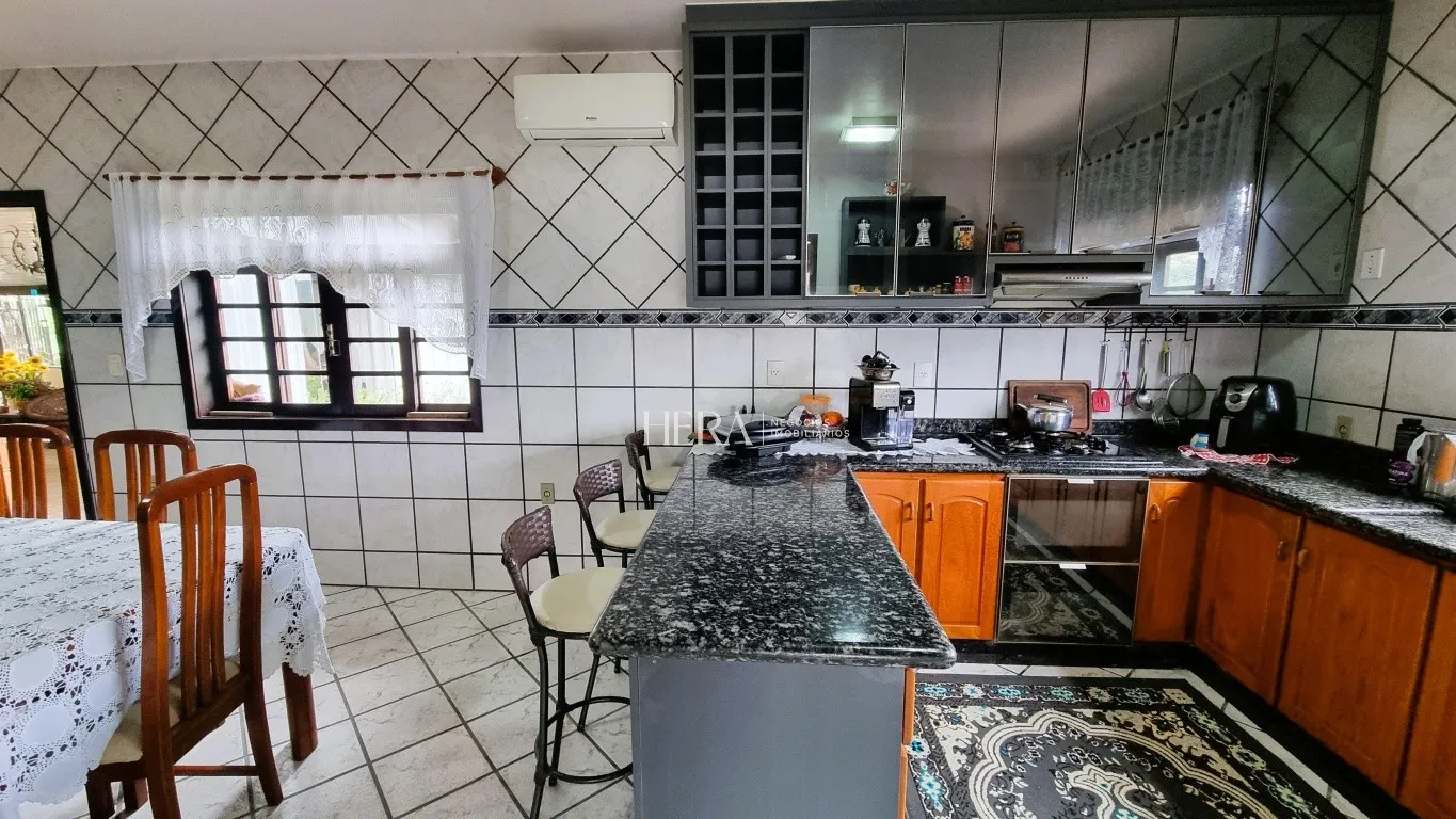Casa no bairro Garcia com 03 dormitórios sendo 01 suíte! Ampla área de lazer. — foto 6