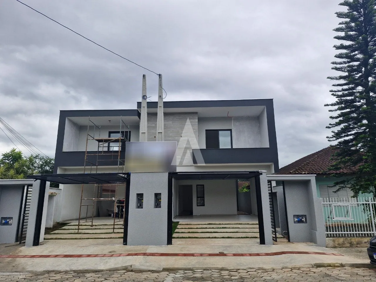 Sobrado Geminado com 3 suíte(s) à venda no bairro Glória em Joinville, de R$ 1.200.000,00 por R$ 1.100.000.00. — foto 5