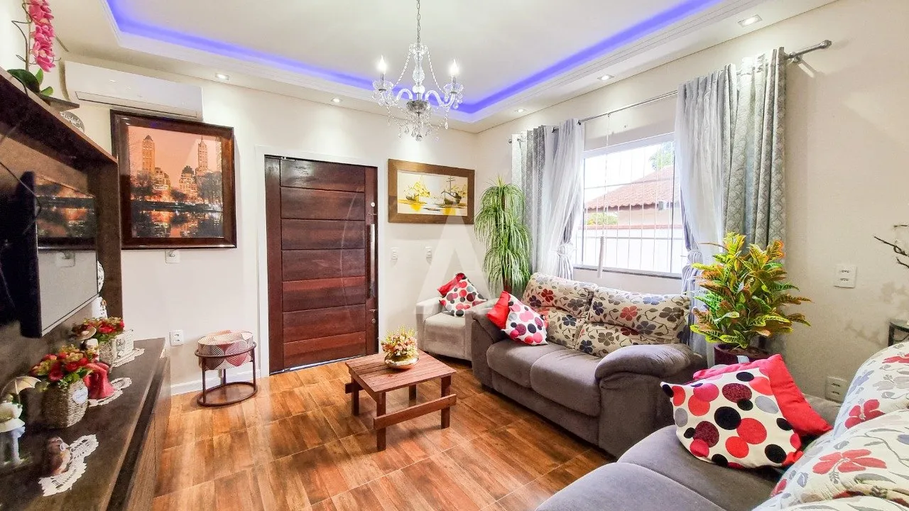 Casa com 1 suíte(s) mais 2 quarto(s) à venda no bairro Itaum em Joinville, por R$ 850.000.00. — foto 2