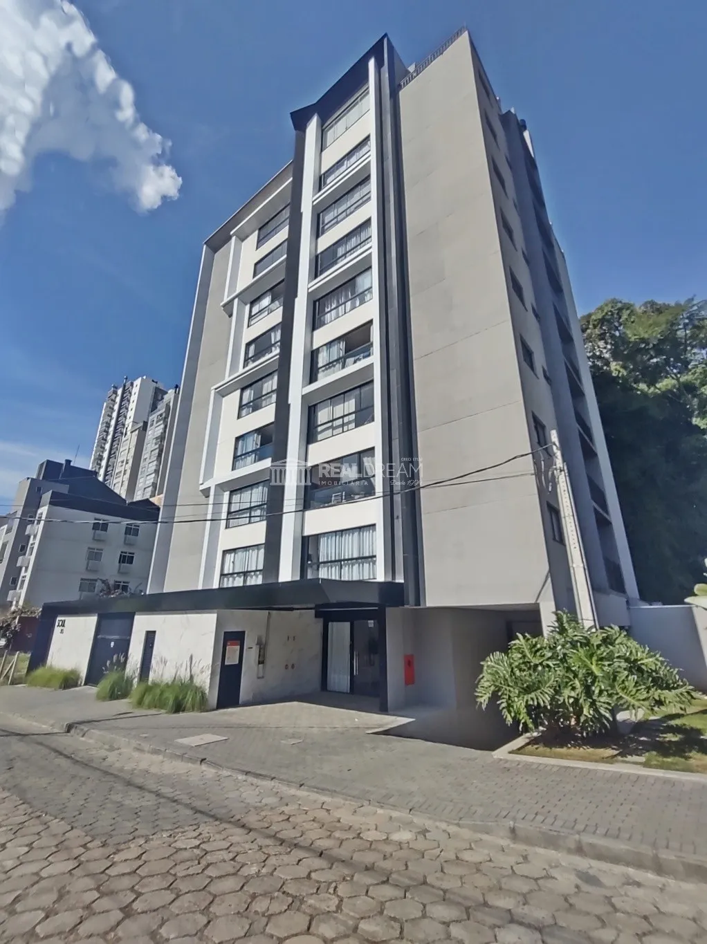 Apartamento com 1 suíte + 1 dormitório, sacada integrada com churrasqueira e uma garagem — foto 2