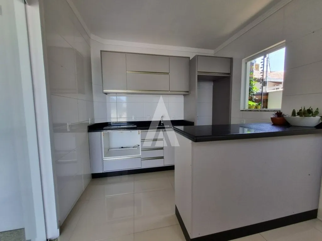 Sobrado Geminado com 1 suíte(s) mais 1 quarto(s) à venda no bairro Floresta em Joinville, por R$ 550.000,00 . — foto 5