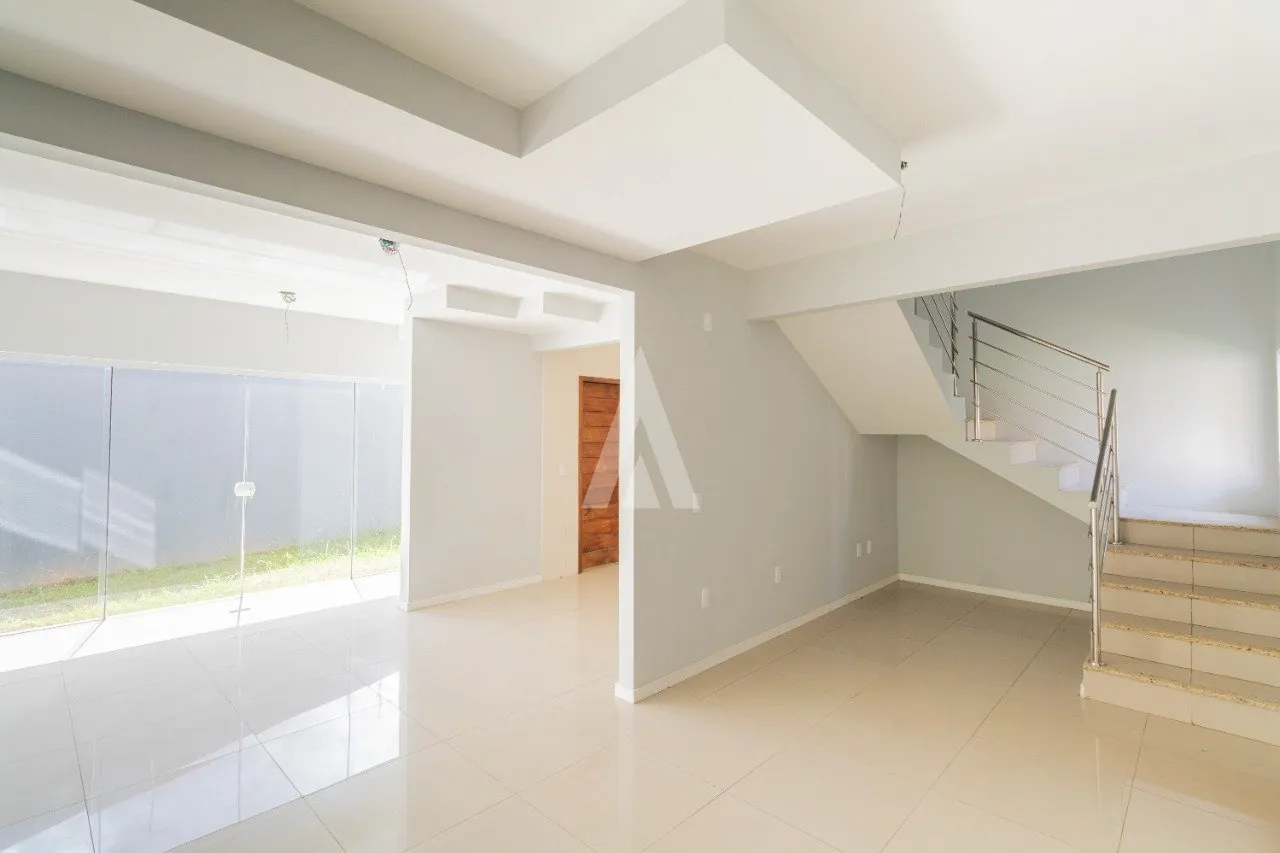 Sobrado em condomínio fechado com 1 suíte mais 2 quartos à venda no bairro Itaum em Joinville - SC, de R$480.000,00 - foto 1