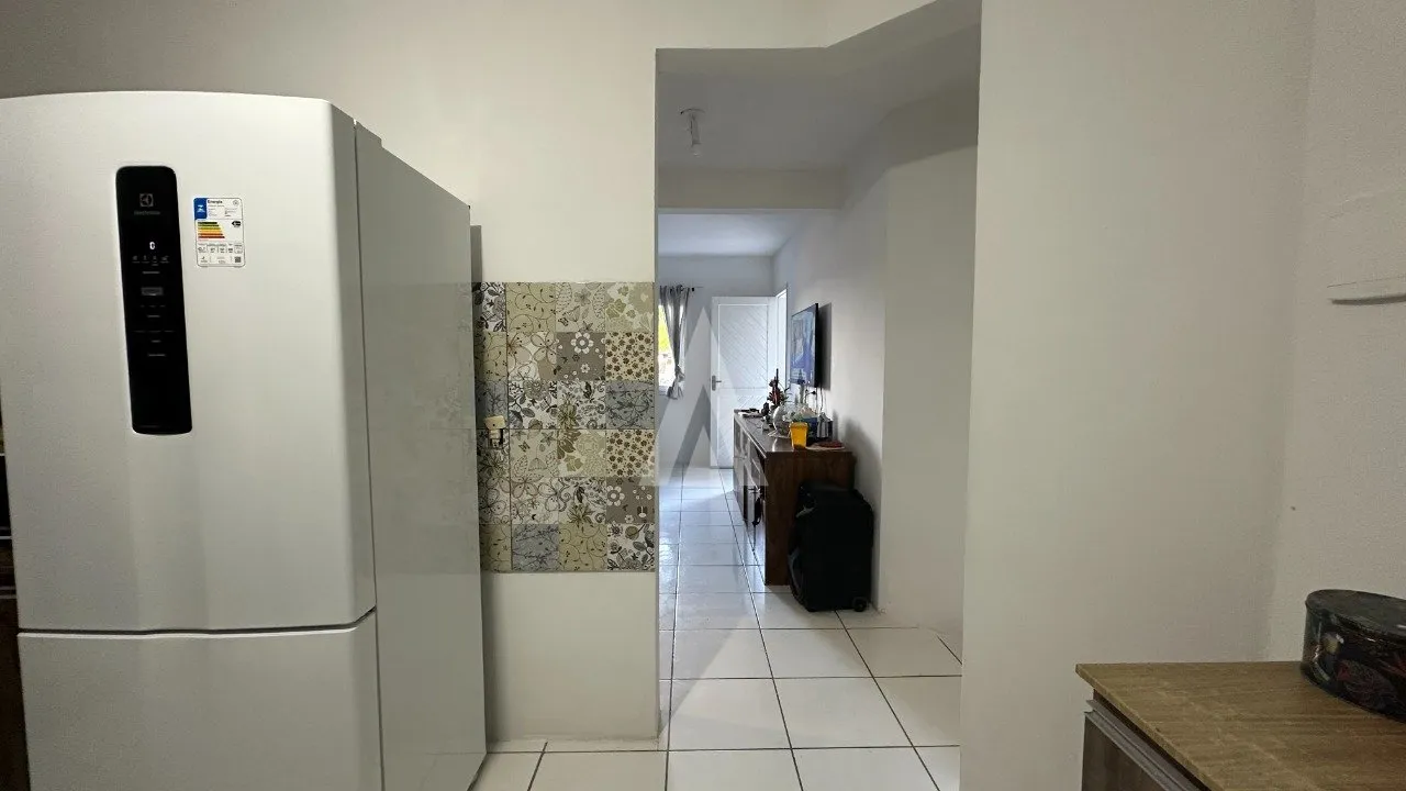Sobrado Geminado com 4 quarto(s) à venda no bairro Pirabeiraba em Joinville, por R$ 650.000.00. — foto 2