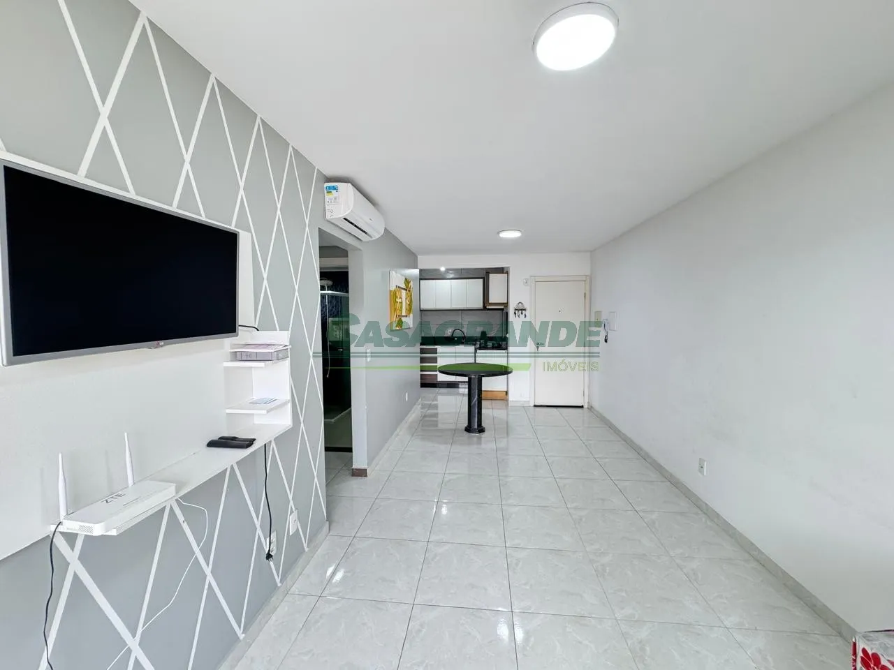 Apartamento no bairro Itoupavazinha, 2 dormitórios, sacada com churrasqueira a carvão, sala de estar e jantar, cozinha com móveis sob medida, área de serviço, 1 vaga de garagem. — foto 2