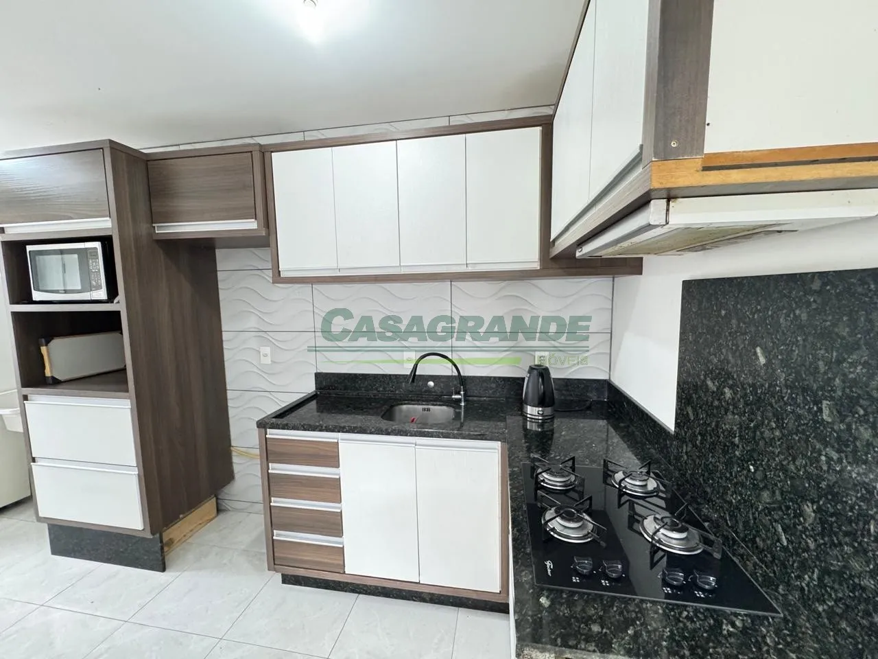Apartamento no bairro Itoupavazinha, 2 dormitórios, sacada com churrasqueira a carvão, sala de estar e jantar, cozinha com móveis sob medida, área de serviço, 1 vaga de garagem. — foto 6