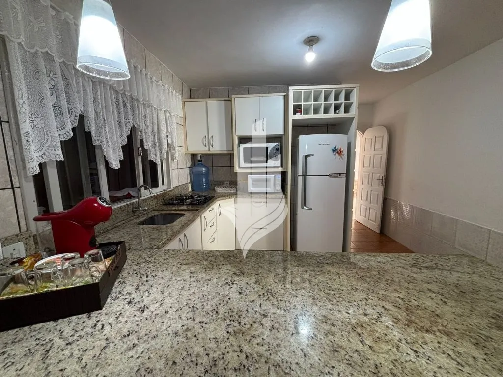 Casa com 3 dormitórios, 1 suíte, 3 vagas de garagem — foto 3