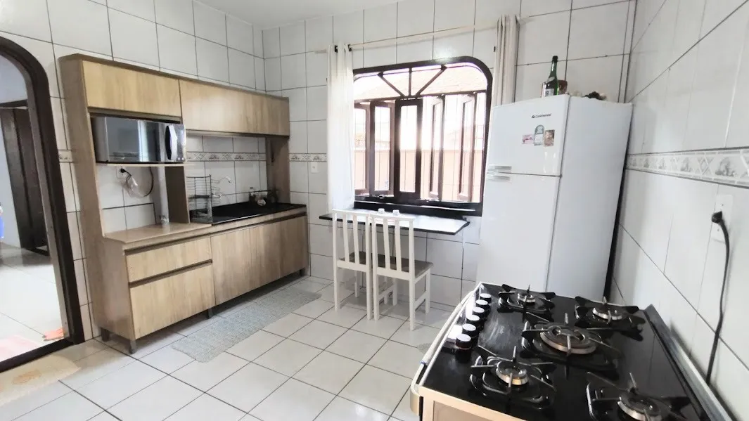 Casa com 3 quarto(s) à venda no bairro Jardim Iririú em Joinville, por R$ 530.000.00. — foto 4