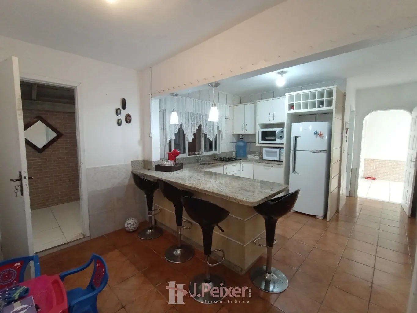 Casa com amplo terreno e 3 dormitórios sendo 1 suíte a venda no Bairro Velha Central — foto 7