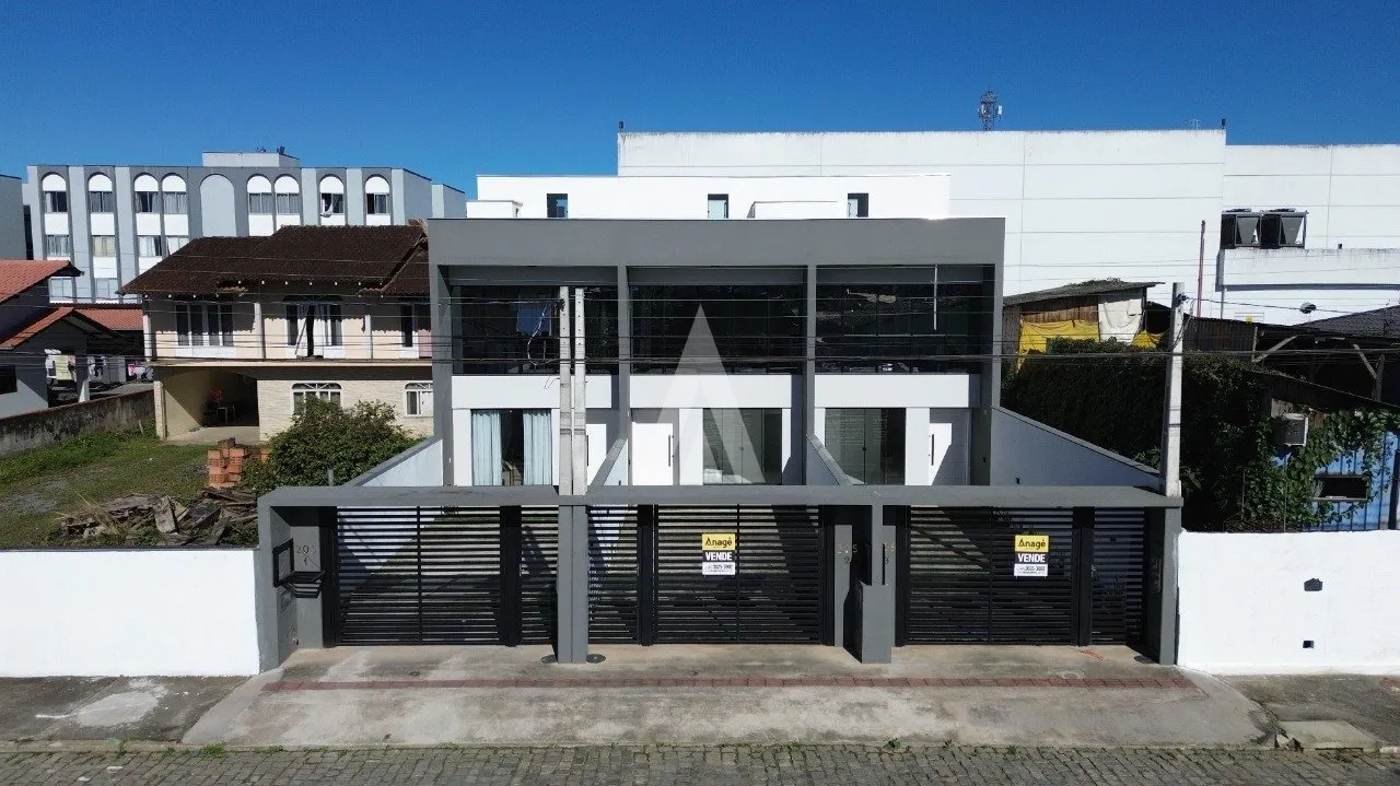 Sobrado geminado com 1 suíte mais 2 quartos à venda no bairro Boa Vista em Joinville - SC de R$ 620.000,00 por R$ 590.000,00 - foto 1