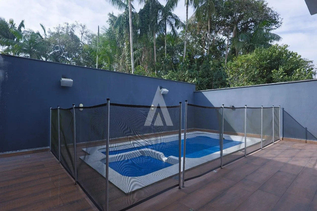 Casa em condomínio fechado com 3 suítes à venda no bairro Vila Nova em Joinville - SC de R$ 2.100.000,00 por R$ 1.890.000,00. — foto 7