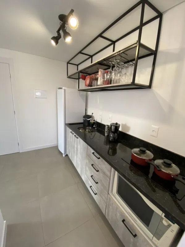 Apartamento novo mobiliado e decorado tipo loft contendo 33m de área privativa e uma vaga de garagem coberta ao lado da Vila Germânica. — foto 5