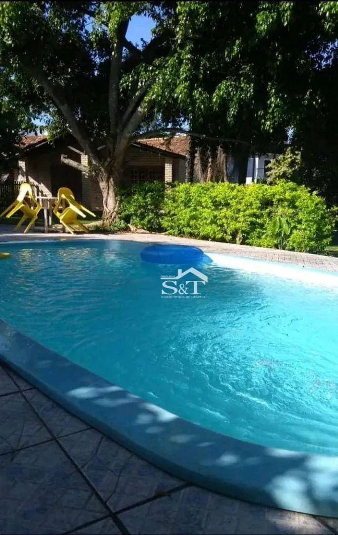 Casa 3 dormitórios, terreno amplo com piscina e churrasqueira! — foto 6