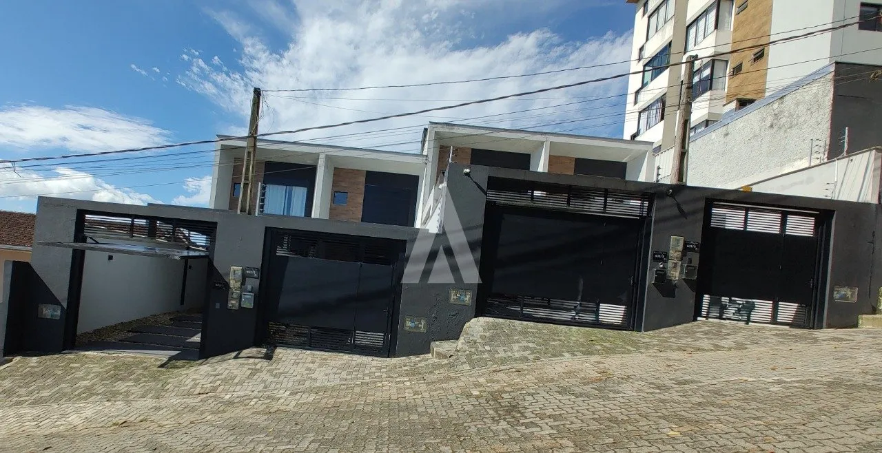 Sobrado geminado com 1 suíte e mais 2 quartos no bairro Itaum em Joinvilleà venda de R$610.000,00 por R$ 590.000,00 - foto 1