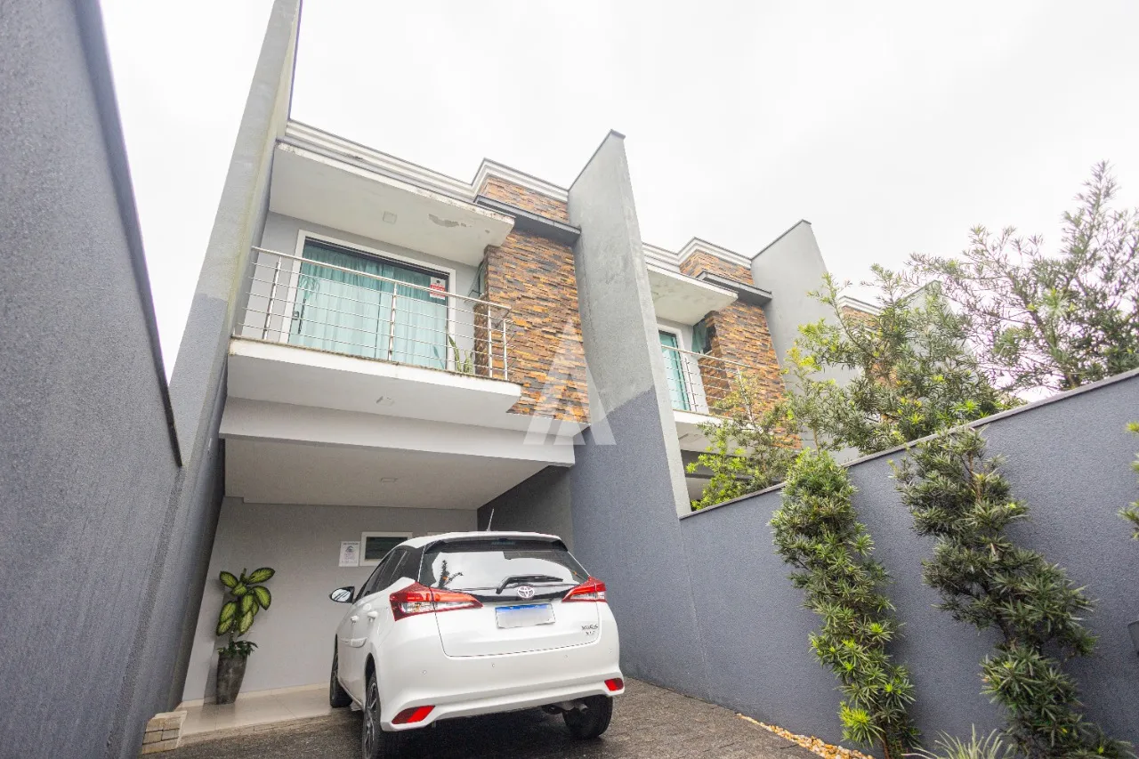 Sobrado Geminado com 1 suíte e 2 quartos à venda no bairro Saguaçu por R$640.000,00. - foto 1