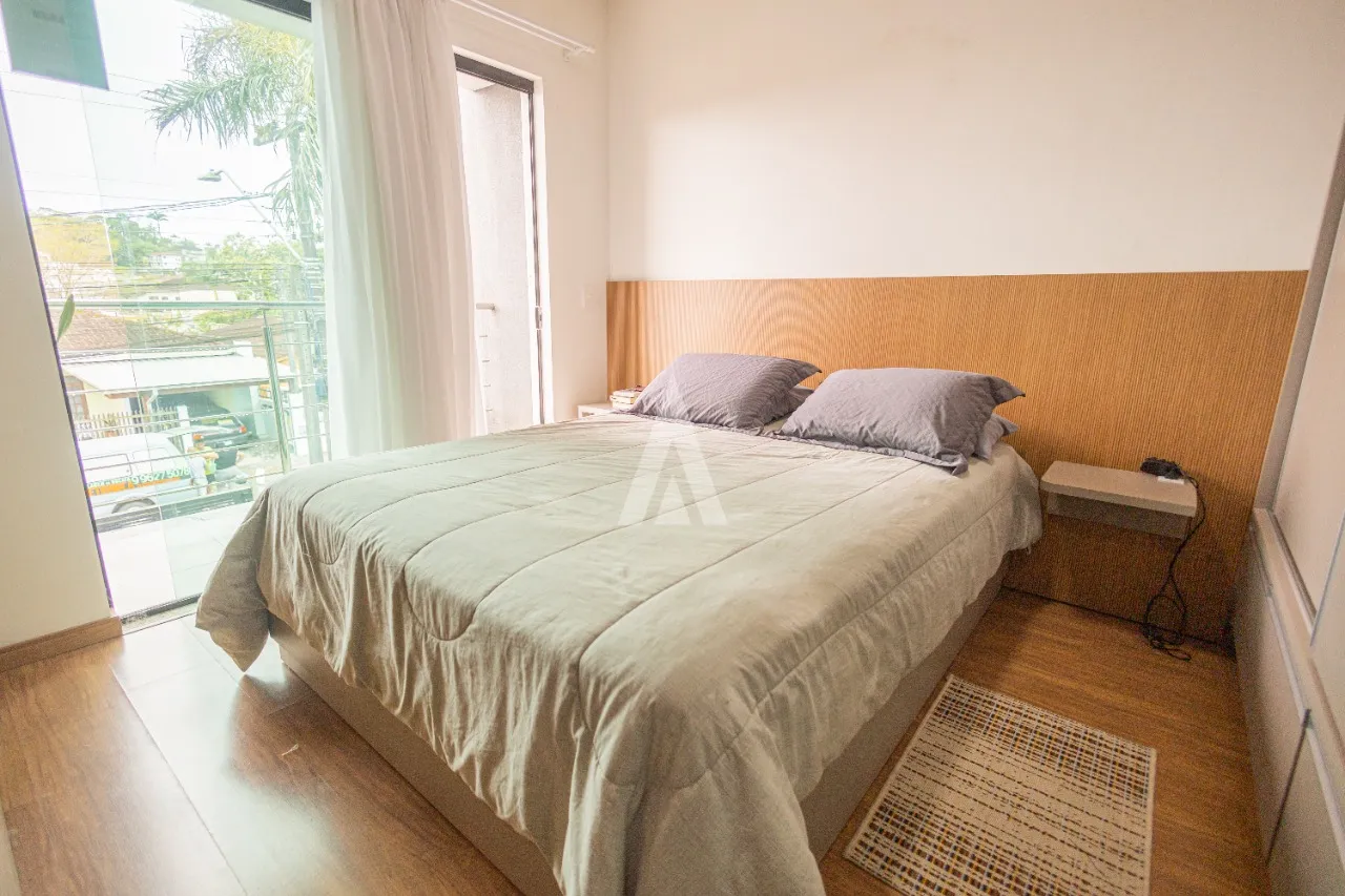 Sobrado Geminado com 1 suíte e 2 quartos à venda no bairro Saguaçu por R$640.000,00. — foto 6