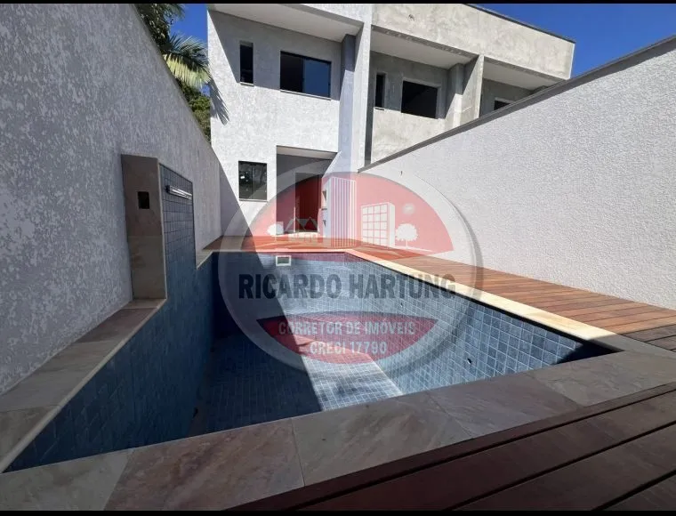 Sobrado novo com área de festa e com piscina no bairro Testo Salto - foto 1