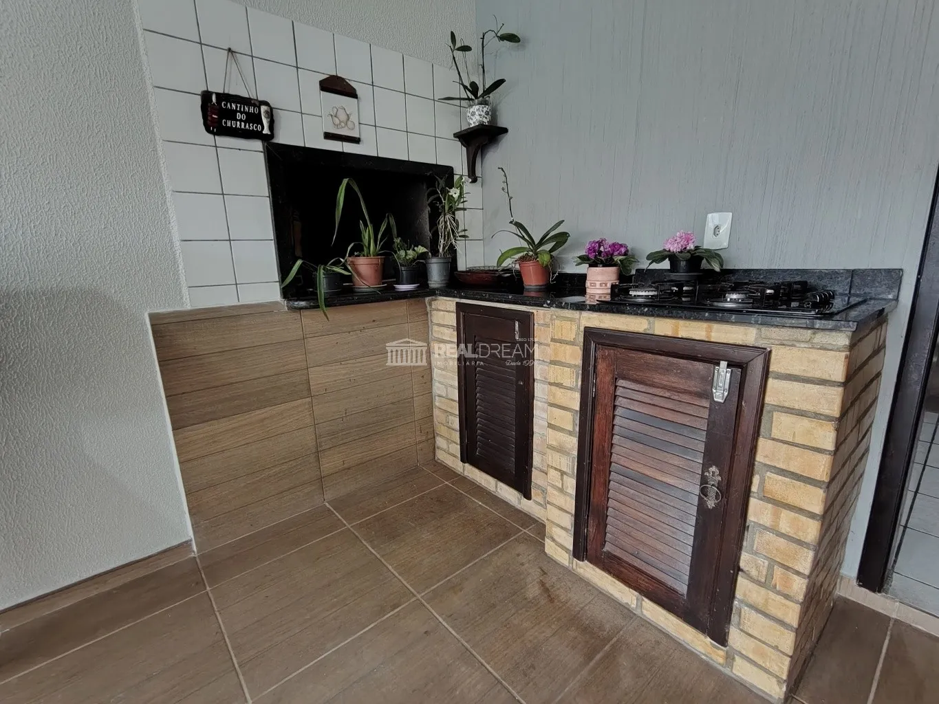 Casa de alvenaria no bairro Fidélis com 3 dormitórios, sendo um suíte, 2 vagas de garagem + 1 estacionamento. — foto 4