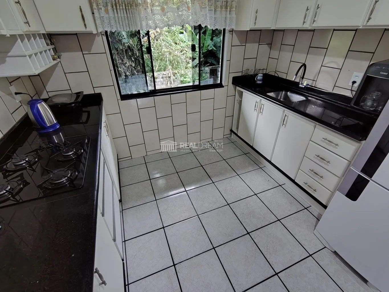 Casa de alvenaria no bairro Fidélis com 3 dormitórios, sendo um suíte, 2 vagas de garagem + 1 estacionamento. — foto 6