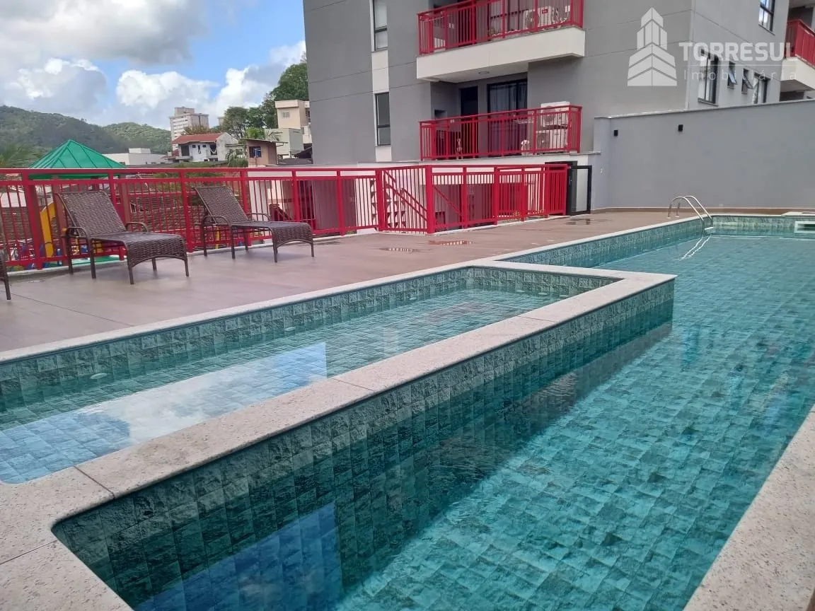 Apartamento de 70m com suíte em condomínio estilo home club , com piscina, brinquedoteca, academia, quiosque e área de festas com churrasqueira privativa. Localização excelente, perto de tudo: padaria, mercado, posto, academia, creches e escolas. - foto 1