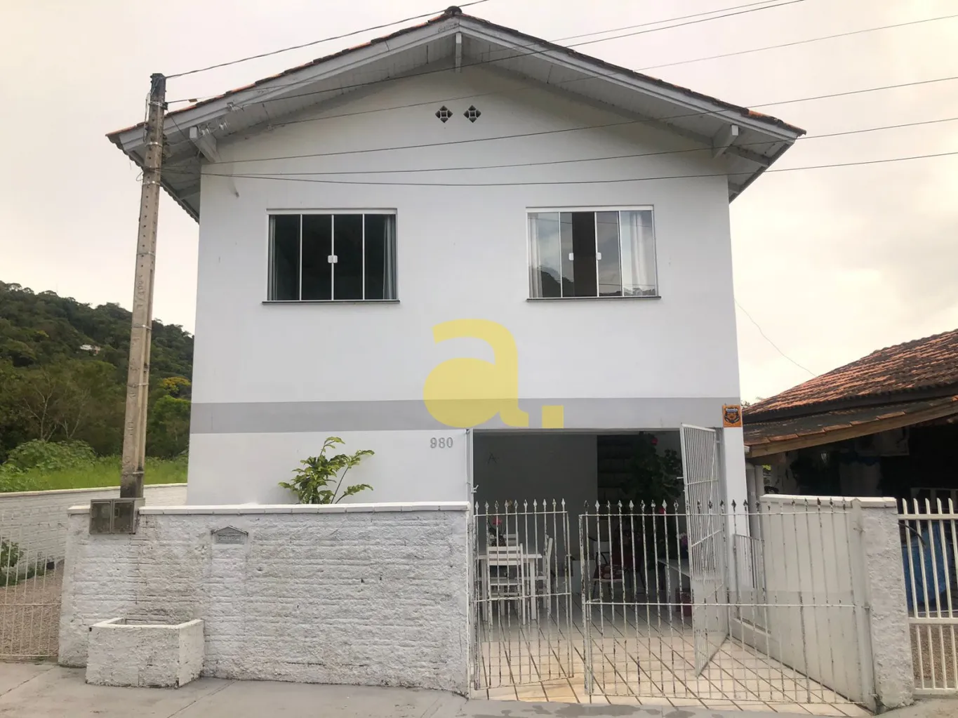 EXCELENTE TERRENO COM 396,00m EDIFICADO COM DUAS CASAS NO BAIRRO BELA VISTA — foto 2