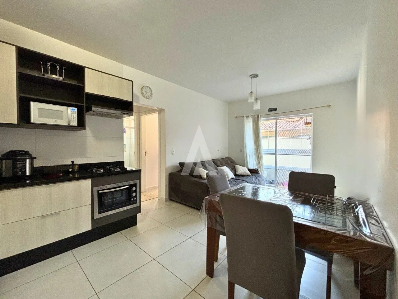 Apartamento com 1 suíte(s) mais 1 quarto(s) à venda no bairro Saguaçu em Joinville, por R$ 360.000.00. — foto 2