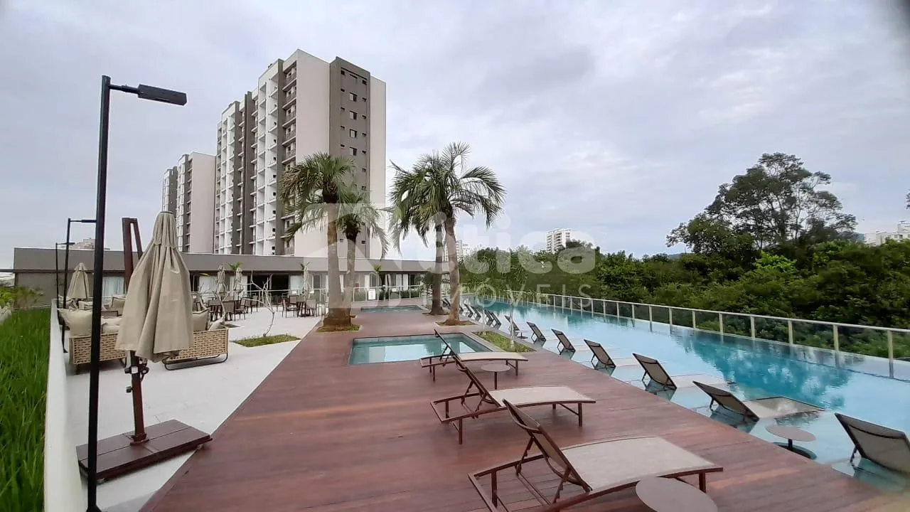 Apartamento Suíte 01 dormitório, sacada c Churrasqueira a carvão, Home Club Completo no São Vicente - foto 1