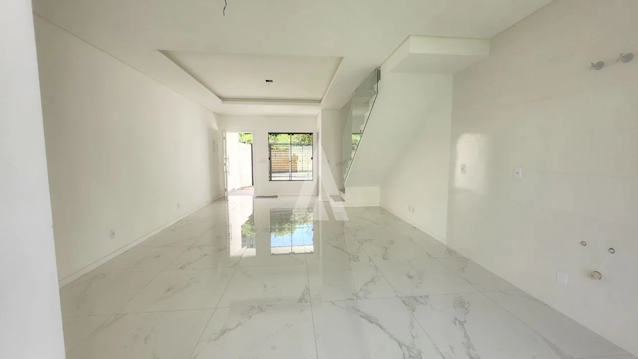 Sobrado geminado com 1 suíte e 2 quartos à venda no bairro Bom Retiro em Joinville-SC por R$ 660.000,00. — foto 3