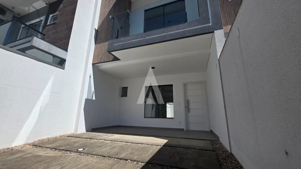 Sobrado geminado com 1 suíte e 2 quartos à venda no bairro Bom Retiro em Joinville-SC por R$ 660.000,00. - foto 1