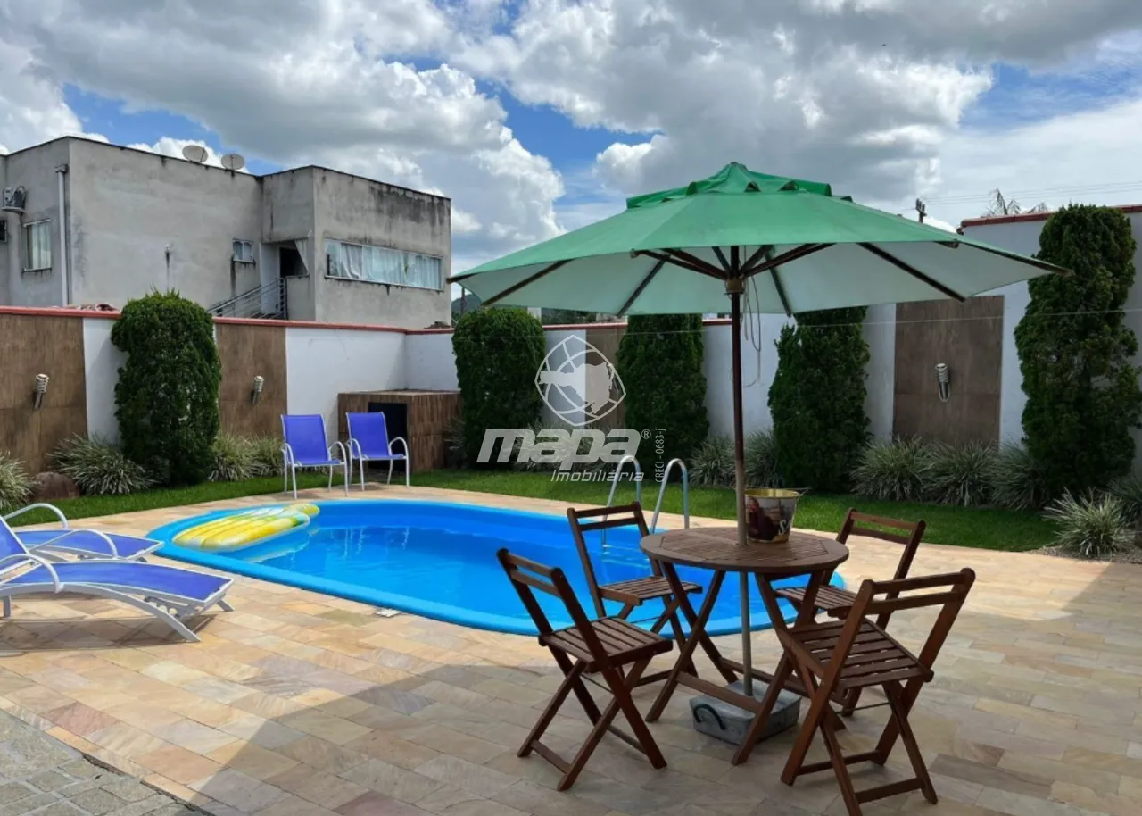 Casa à venda em Timbó Bairro Capitais 4 vagas, 2 suítes, piscina e área externa ampla — foto 4