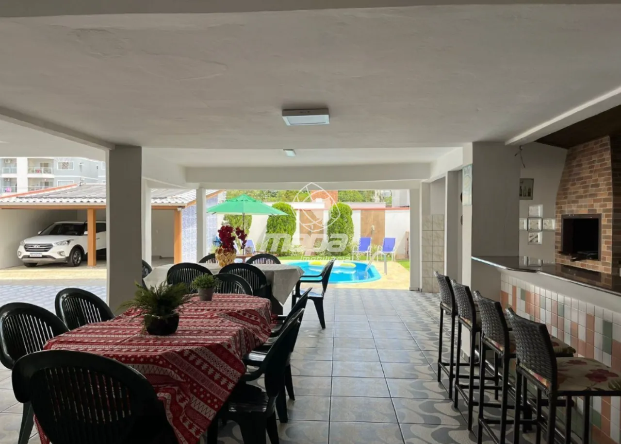 Casa à venda em Timbó Bairro Capitais 4 vagas, 2 suítes, piscina e área externa ampla — foto 5