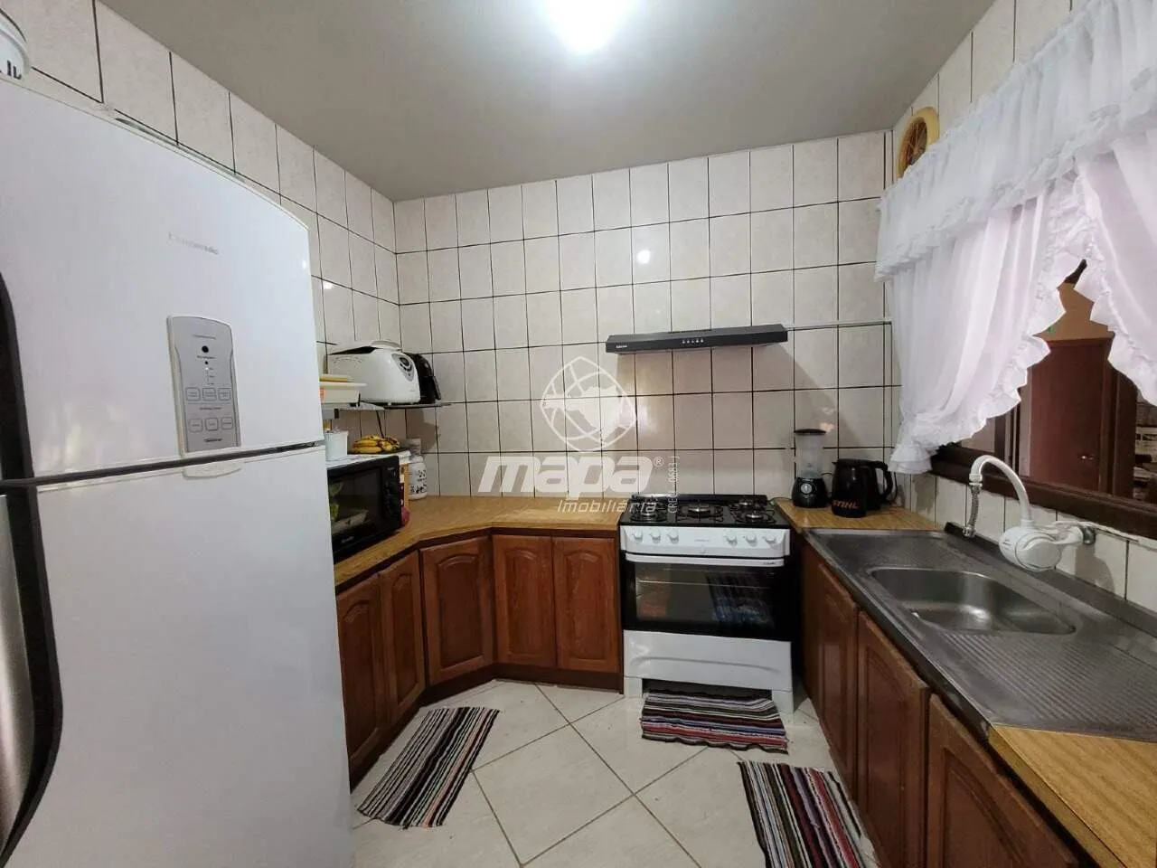 Casa com amplo espaço de terreno — foto 3