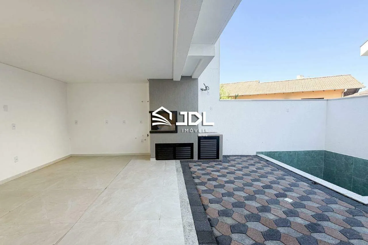 Excelente casa no Bairro Escola Agrícola com 3 suítes - foto 1