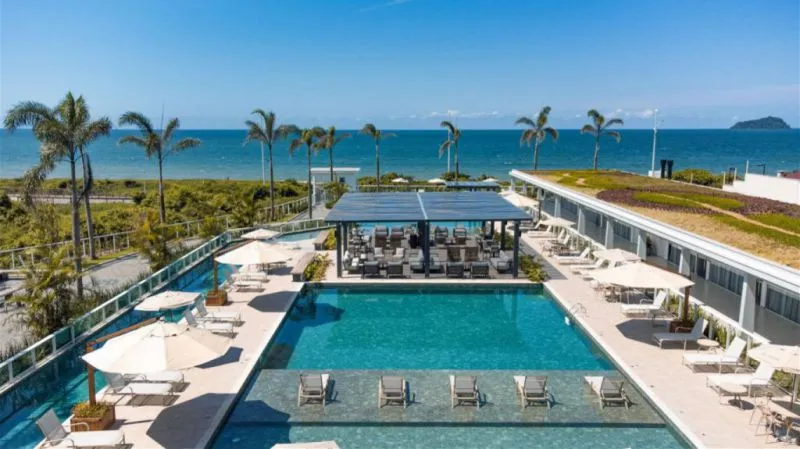 Apartamento com 3 quartos em um Home Club pé na areia em Balneário Piçarras — foto 2