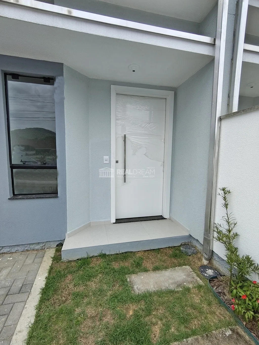 Casa geminada com 1 suíte e + 1 dormitório — foto 2