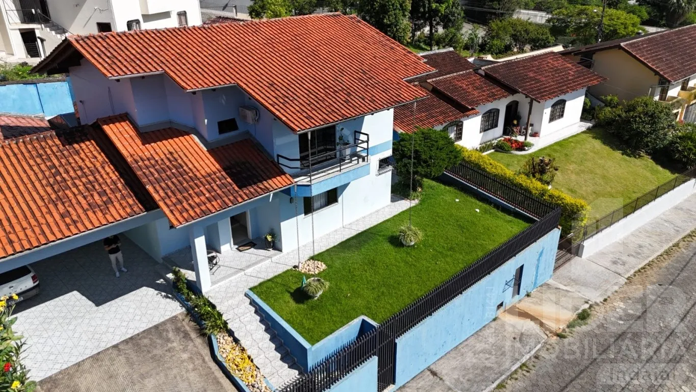 Casa no bairro Escola Agrícola com 327,23m de área construída com 1 suíte + 3 dormitórios — foto 3