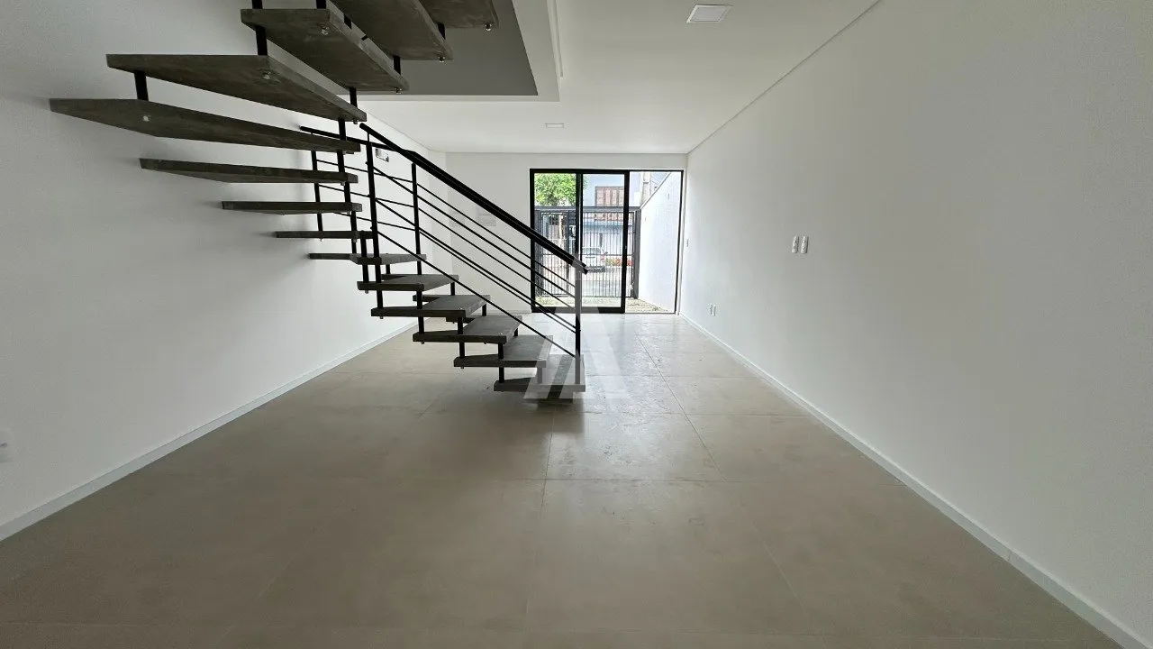 Sobrado Geminado com 2 suíte(s) à venda no bairro Costa e Silva em Joinville, por R$ 450.000.00. — foto 4