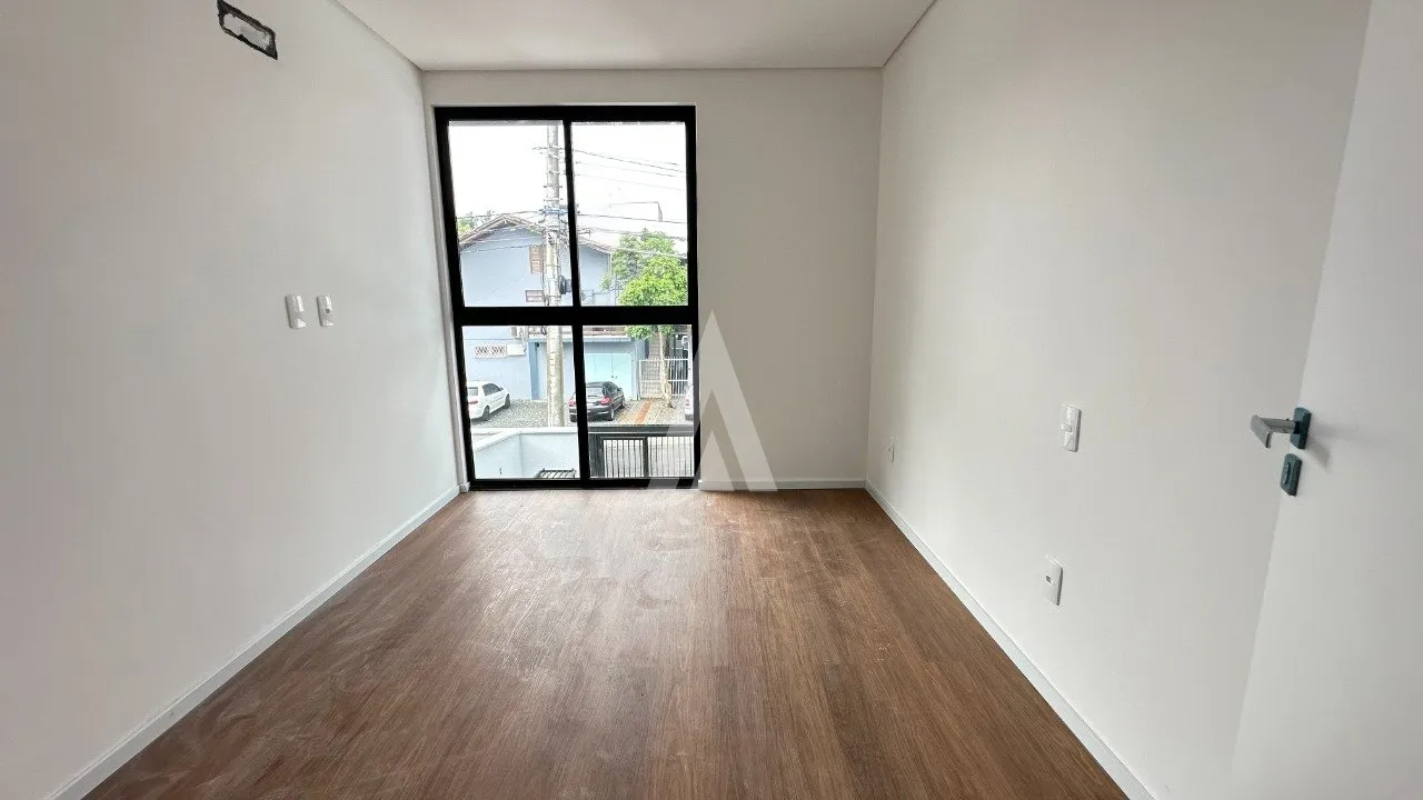 Sobrado Geminado com 2 suíte(s) à venda no bairro Costa e Silva em Joinville, por R$ 450.000.00. — foto 7